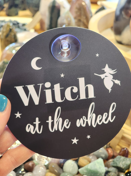 Witch at the wheel window sign